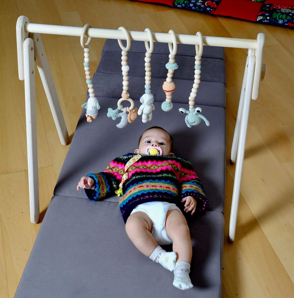 montessori-baby-gym-hanging-toys-set-wooden-play-gym-for-babies-Gift-Baby-Toys-22